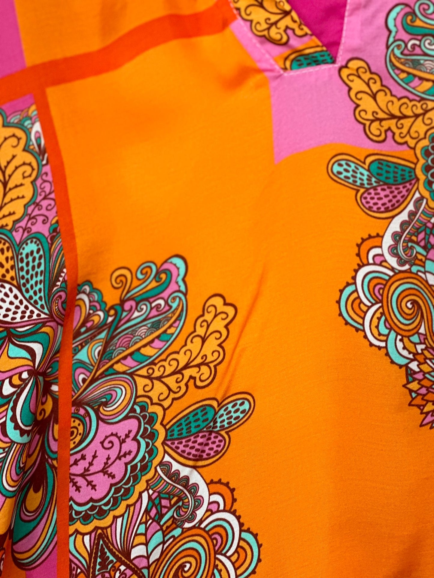 Oranje blouse met printmotief